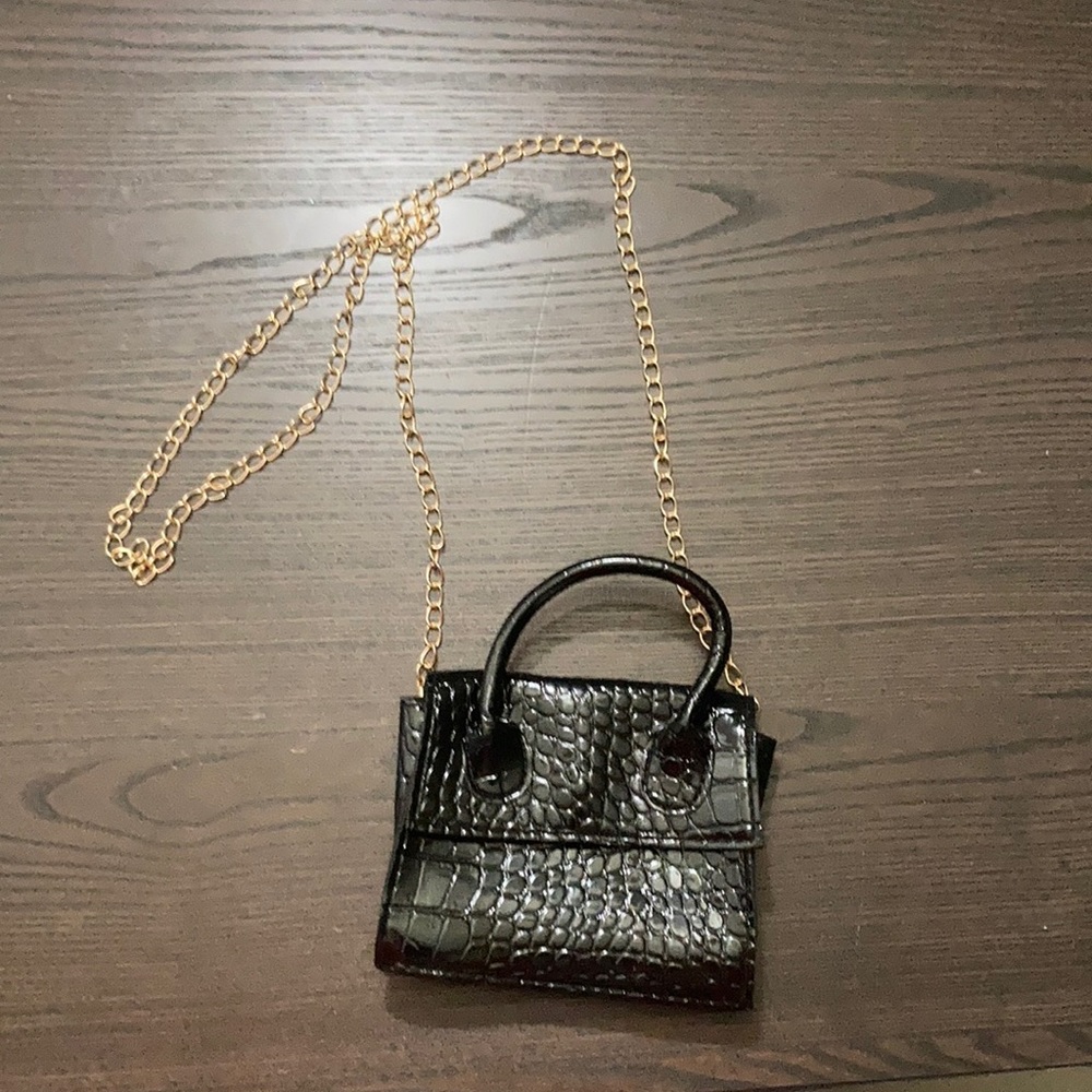 Tiny black purse